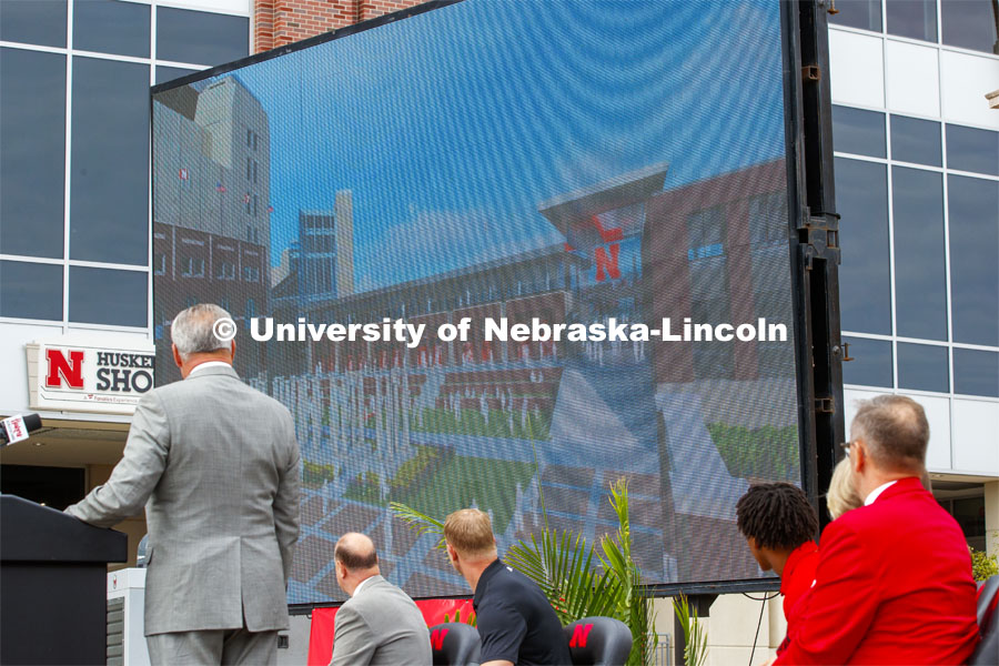Athletic Director Bill Moos and the podium dignitaries watch a video about the new project. Ceremony for Nebraska is planning a 350,000-square-foot athletics facility will be constructed east and north of Memorial Stadium. Work will begin summer 2020 and be completed in summer 2022. September 27, 2019. Photo by Craig Chandler / University Communication.