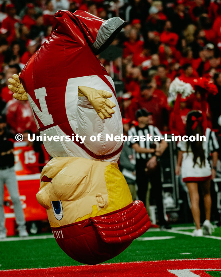 Lil’ red jumping on his head in the middle of Memorial Stadium. Nebraska vs. Ohio State University football game. September 28, 2019. Photo by Justin Mohling / University Communication.
