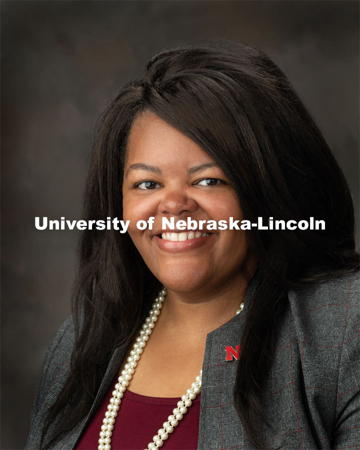 Studio portrait of NKenge Friday, Assistant Vice Chancellor for Strategic Initiatives. September 30, 2019. Photo by Gregory Nathan / University Communication.