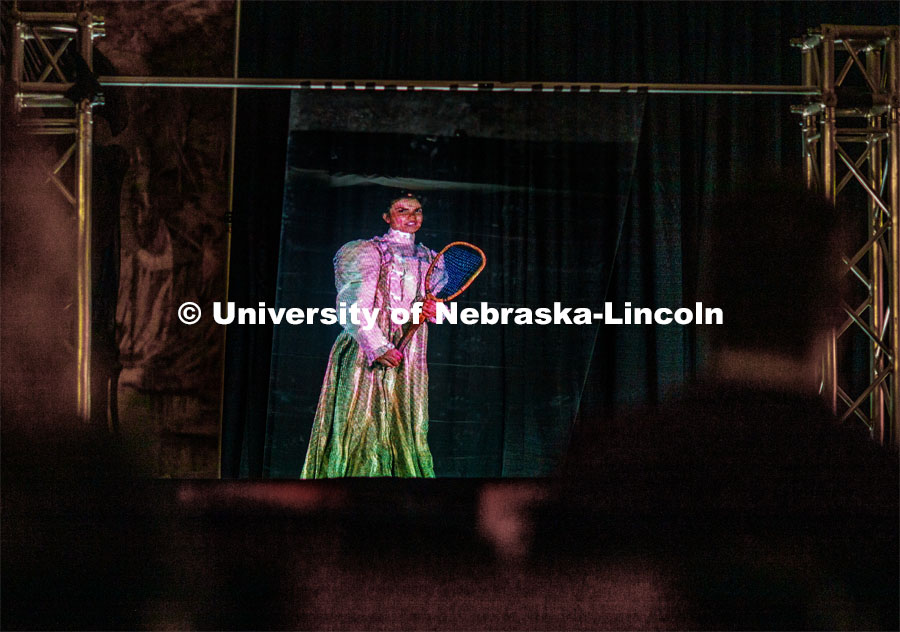 A hologram produced by engineering students using a fellow student in the role of Louise Pound talks with Debra Kleve White, alumni and former member of the spirit squad, during the lecture. White presented the Homecoming Nebraska Lecture, “Louise Pound and the History of UNL School Spirit”. October 4, 2019. Photo by Craig Chandler / University Communication.