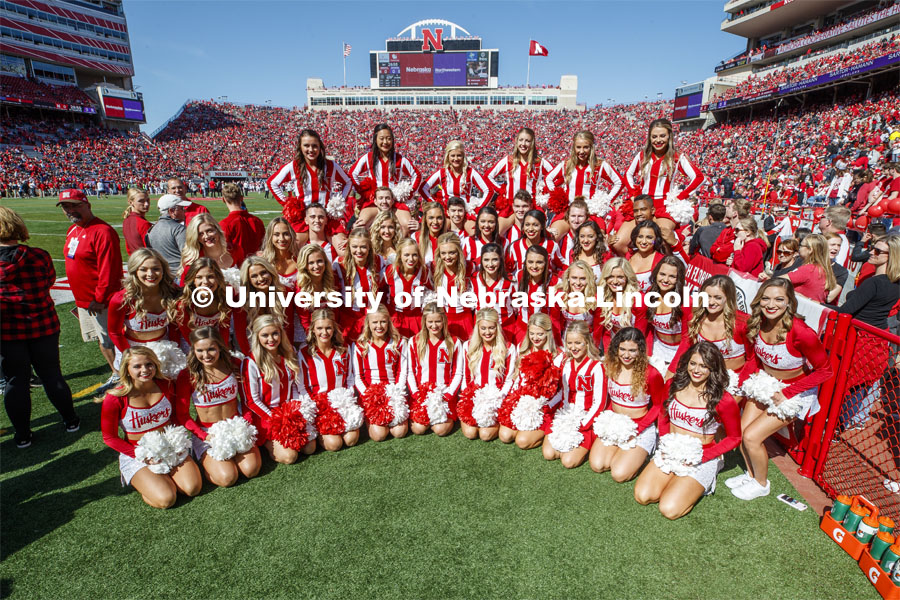 Members of the Scarlet dance team and the Cheer Squad pose for a group picture. Nebraska vs. Northwestern University football game. Homecoming 2019. October 5, 2019.  Photo by Craig Chandler / University Communication.