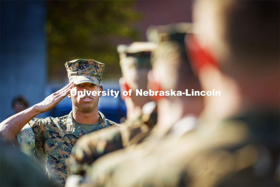 As unit leader, battalion executive officer Ramarro Lamar leads the platoon of Naval ROTC members in practicing their conduct of drill. Lamar is a member of the Husker Cheer Squad and a midshipman in the Naval ROTC unit. October 8, 2019. Photo by Craig Chandler / University Communication.