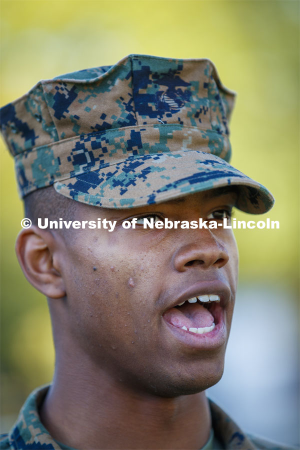 As unit leader, battalion executive officer Ramarro Lamar leads the platoon of Naval ROTC members in practicing their conduct of drill. Lamar is a member of the Husker Cheer Squad and a midshipman in the Naval ROTC unit. October 8, 2019. Photo by Craig Chandler / University Communication.
