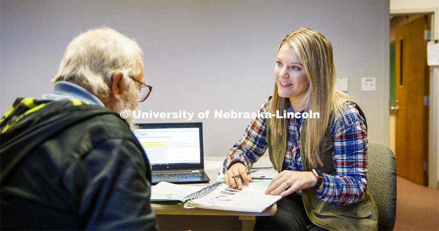 Terry Hatch (left) participates in a speech therapy session with Jenna Haverkamp, a graduate student in Nebraska's speech-language pathology program in the Barkley Center. Aphasia Clinic in the Barkley Center. October 14, 2019. Photo by Craig Chandler / University Communication.