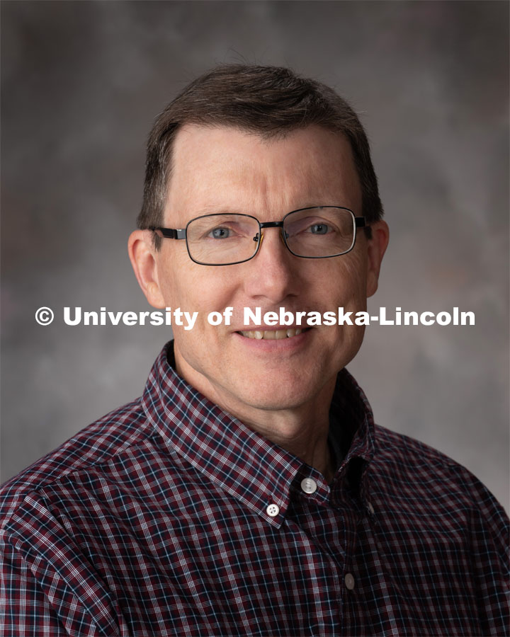 Studio portrait of Tom Albin, Operations Coordinator, Computer Engineering Science. October 28, 2019. Photo by Gregory Nathan / University Communication.