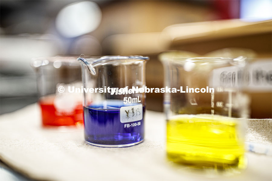 Chem 109 lab, beakers of  different food dyes. Chemistry Lab in Hamilton Hall. November 7, 2019. Photo by Craig Chandler / University Communication.