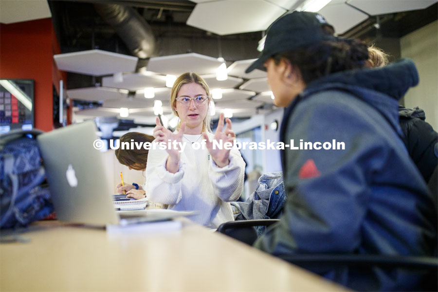 Arden Fechtmeister advises chemistry students while working as a teaching assistant in the Chemistry Resource Center. Chemistry Lab in Hamilton Hall. November 7, 2019. Photo by Craig Chandler / University Communication.
