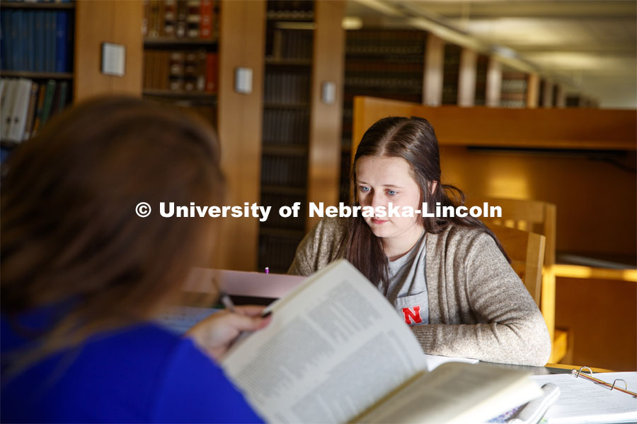 Students studying together in the Law Libraray. College of Law photo shoot. November 7, 2019. Photo by Craig Chandler / University Communication.