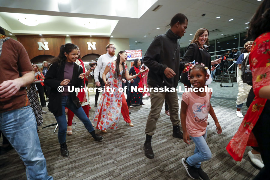 A group dances during a break in between performers. Global Huskers Festival, a multicultural festival provides attendees the chance to explore the world through informational booths that will have food, cultural décor, art, and more, each hosted by UNL students from those culture. November 19, 2019. Photo by Craig Chandler / University Communication.