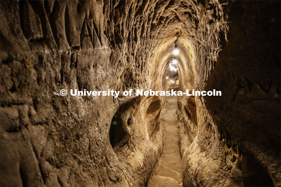 A passage through Robbers Cave. Professor Ricky Wood uses LIDAR to digitally map Robbers Cave in Lincoln. November 22, 2019. Photo by Craig Chandler / University Communication.