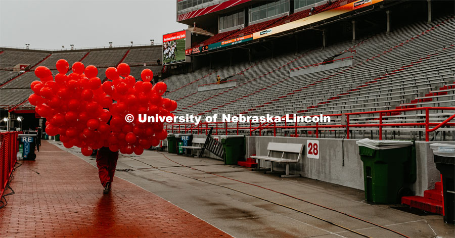 Getting first touchdown ballons ready for game. Nebraska vs. Iowa State University football game. November 29, 2019. Photo by Justin Mohling / University Communication.