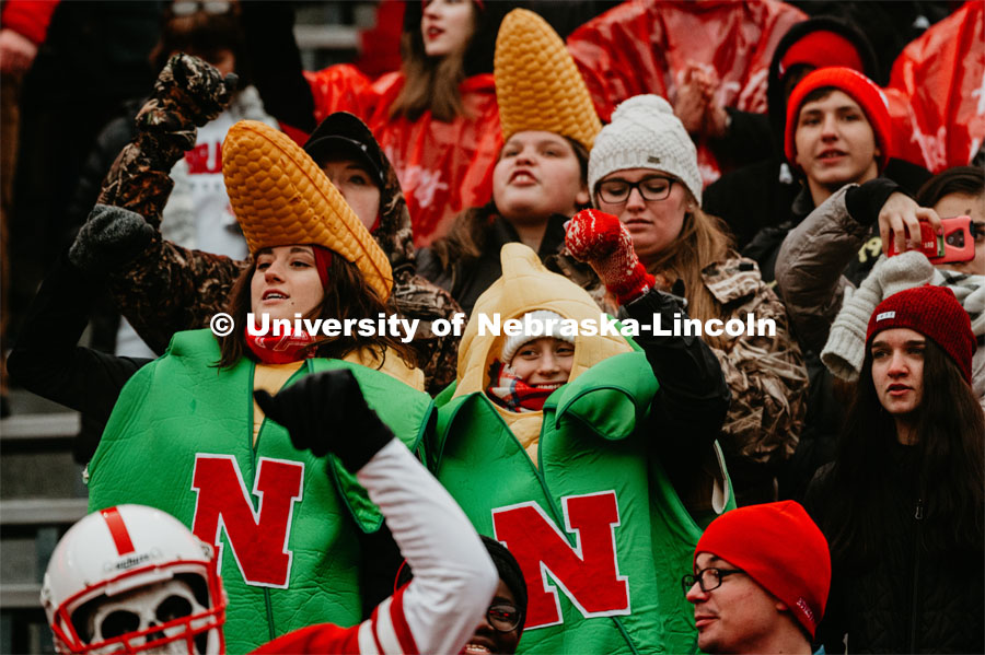 Students dancing, dressed like corn. Nebraska vs. Iowa State University football game. November 29, 2019. Photo by Justin Mohling / University Communication.