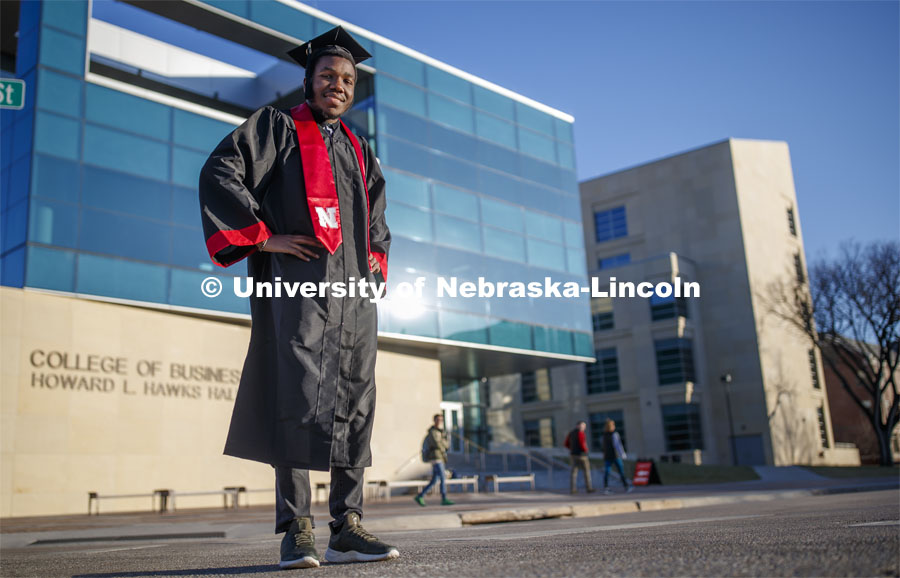 Quincey Bernard, an international business student graduating this December, plans to use what he's learned at Nebraska over the last three years to give back to his home country of Haiti. Quincey is pictured in front of Hawks Hall. December 6, 2019. Photo by Craig Chandler / University Communication.
