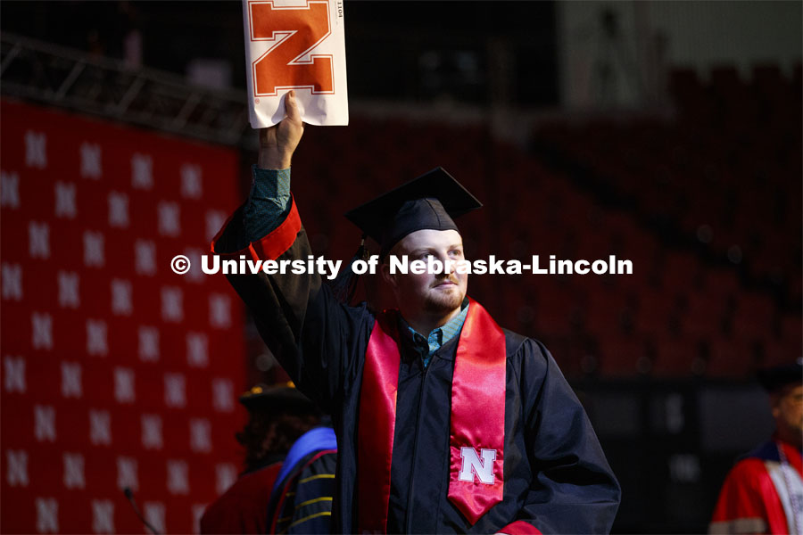 Nathan Woodrum celebrates his animal science degree. December Undergraduate commencement at Pinnacle Bank Arena. December 21, 2019. Photo by Craig Chandler / University Communication.