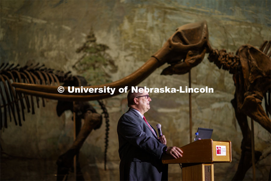 Bob Wilhelm, vice chancellor for research and economic development, begins the Nebraska Lecture as a Stegomastodon skeleton stands in the background. Ross Secord's lecture, Looking Back and Looking Forward: The History of Vertebrate Paleontology at the University of Nebraska State Museum, was given at the Nebraska State Museum. January 28, 2020. Photo by Craig Chandler / University Communication.
