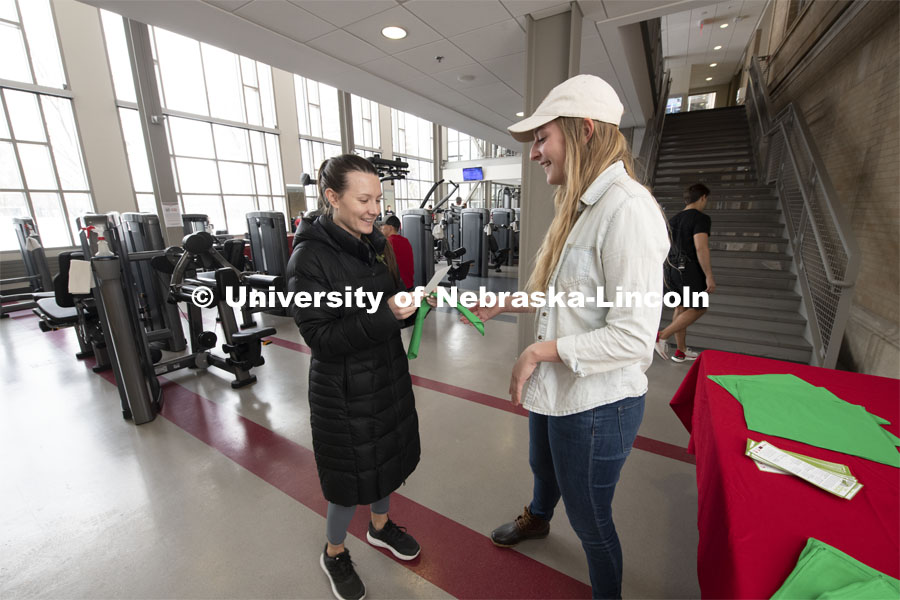 The Bandana Project is a new campaign at UNL. The bandanas are being given out to promote mental health awareness on campus. Alex Otto from Omaha discusses the program to Jamie Foote. January 29, 2020. Photo by Gregory Nathan / University Communication.