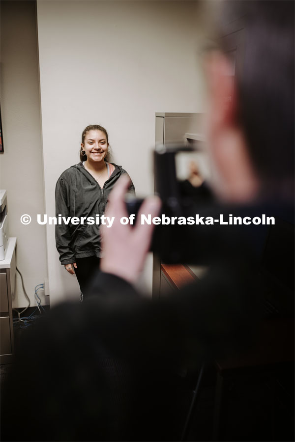 Olivia Cano has her photo taken by Scott Hurst. She was a winner in the Husker Passport Giveaway sponsored by Education Abroad. January 30, 2020. Photo by Craig Chandler / University Communication.