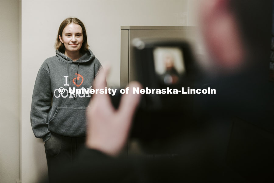 Grace Gawecki has her photo taken by Scott Hurst. She was a winner in the Husker Passport Giveaway sponsored by Education Abroad. January 30, 2020. Photo by Craig Chandler / University Communication.