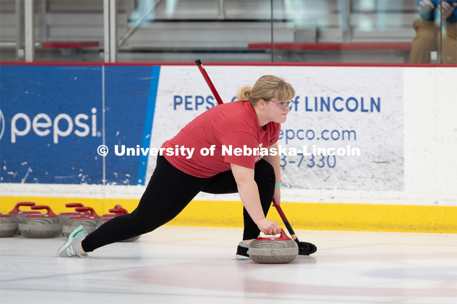 Anna Fiala of the UNL Curling Team throws a stone. Nebraska's nationally-ranked curling club host its first bonspiel at the John Breslow Ice Hockey Center this weekend. The bonspiel — or tournament — featured seven traveling schools from across the Midwest. February 1, 2020. Photo by Gregory Nathan / University Communication.