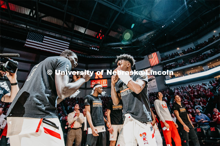 Akol Arop and Cam Mack do a pregame handshake. Nebraska vs. Wisconsin State University men’s basketball game. February 15, 2020. Photo by Justin Mohling / University Communication.