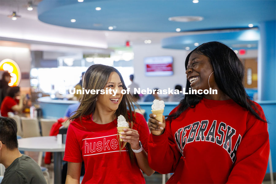 Cather Dining Center photoshoot. Young women eating ice cream in the Cather Dining Center. March 2, 2020 Photo by Craig Chandler / University Communication.