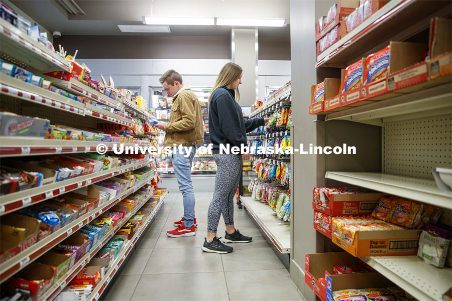 Abel Sandoz Dining Center photo shoot. Students shopping in Herbie's Market convenience store. March 3, 2020. Photo by Craig Chandler / University Communication.