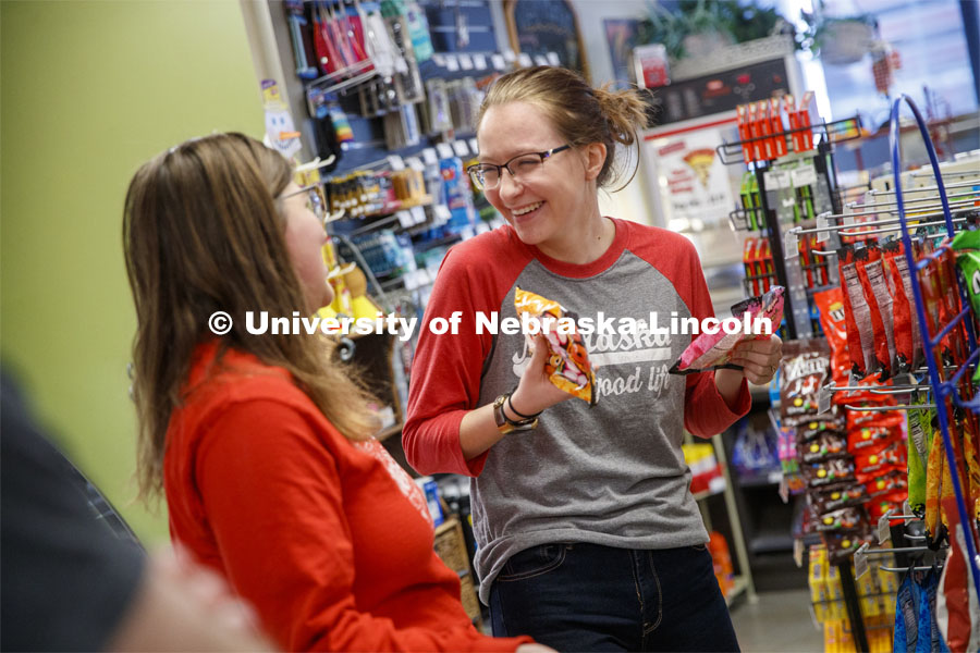 Harper Dining Center photo shoot. Young women buying snacks at Herbie’s Market. March 3, 2020. Photo by Craig Chandler / University Communication.