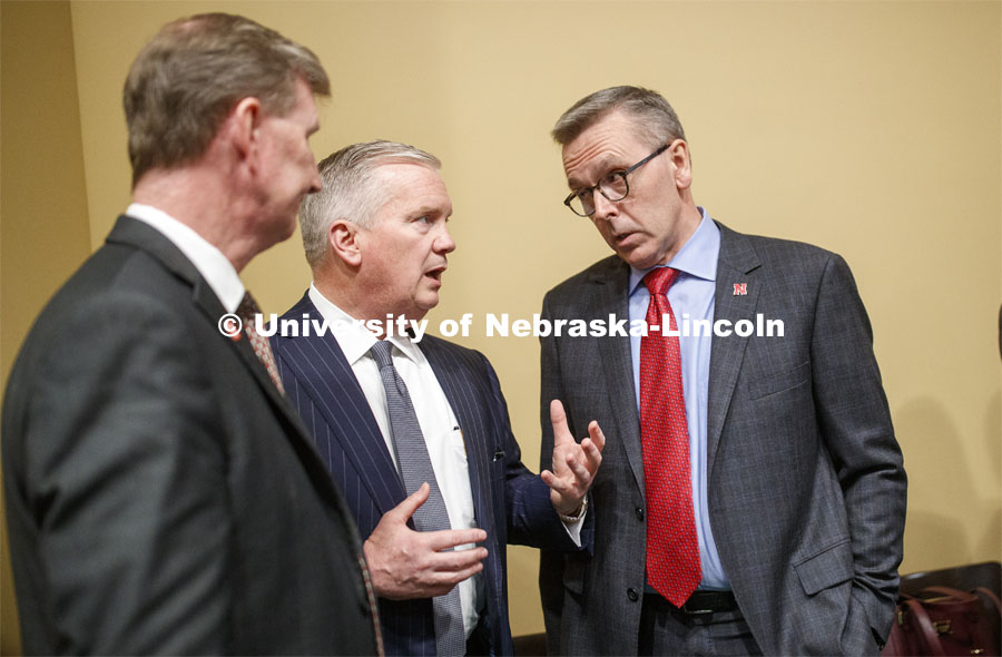 Regent Timothy Clare, center, talks with NU President Ted Carter at left and UNL Chancellor Ronnie Green at right. NU Advocacy Day at the Capitol. March 10, 2020. Photo by Craig Chandler / University Communication.