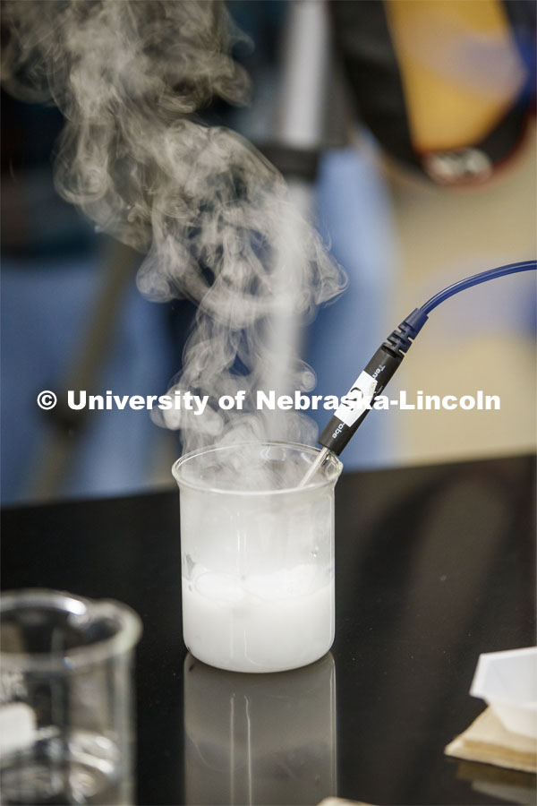 Calcium in water lets off steam as it heats the water as part of the lab. As a result of the Corona virus, Faculty are recording Chemistry labs in Hamilton Hall to prepare for the start of remote learning. March 24, 2020. Photo by Craig Chandler / University Communication.