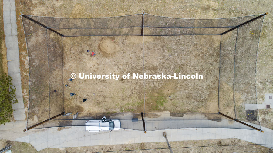 Carrick Detwiler and his students from the NIMBUS Lab work with several drones flying with each other in the new NIC outdoor flying facility at Nebraska Innovation Campus. March 24, 2020. Photo by Craig Chandler / University Communication.