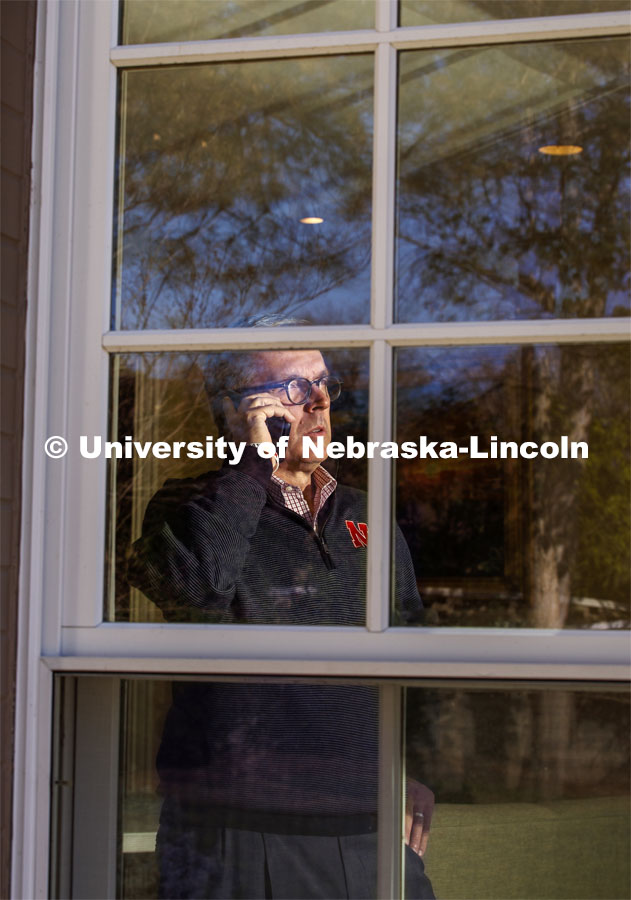 Due to COVID-19 and campus shut down, Chancellor Ronnie Green is on the phone working from home. April 15, 2020. Photo by Craig Chandler / University Communication.