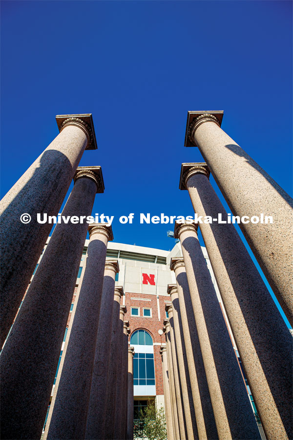 Looking through the columns and the east side of Memorial Stadium. City Campus. April 25, 2020. Photo by Craig Chandler / University Communication.