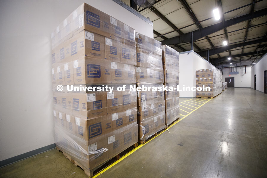 Pallets of boxes full of pieces for the 1,500+ hand sanitizer stations to be produced for the UNL campuses. May 21, 2020. Photo by Craig Chandler / University Communication.