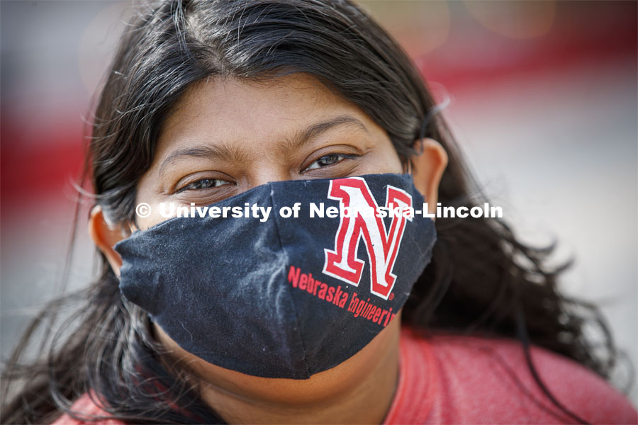 Sunandita Sarker, PhD student in mechanical engineering, wears a protective mask she made from one of her engineering t-shirts. May 28, 2020. Photo by Craig Chandler / University Communication.
