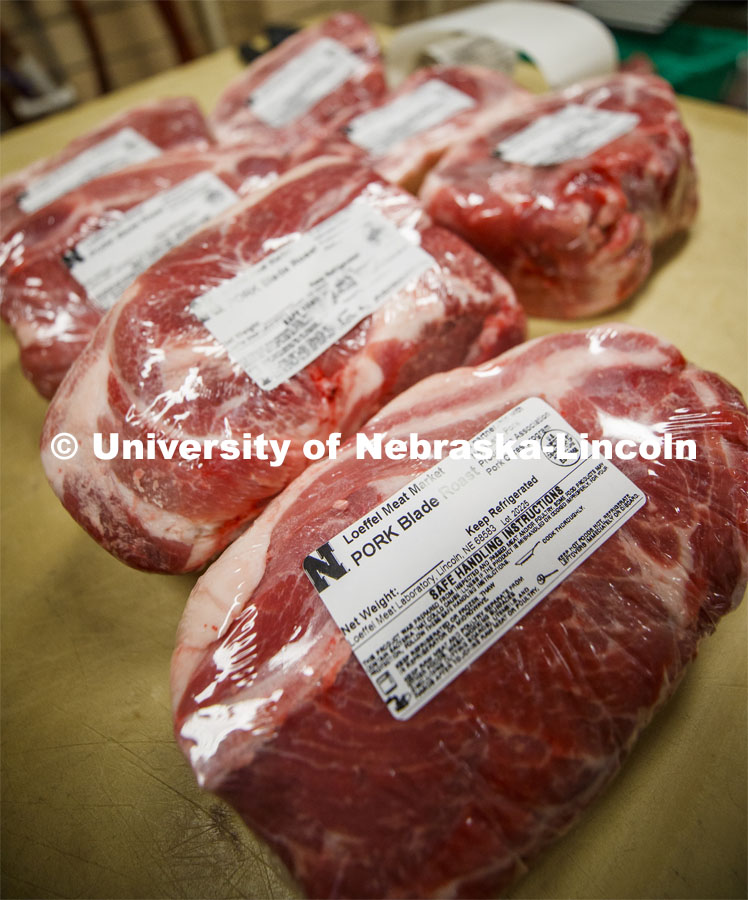 Packaged meat is ready for donation. UNL's Loeffel Meat Laboratory in partnership with the Nebraska Pork Producers Association Pork Cares program process more than 1500 pounds of pork for the Heartland of America Food Bank in Omaha. This is the second donation being processed for food banks. Friends and family of Bill and Nancy Luckey of Columbus donated the pigs. The first donation went to the Lincoln Food Bank. The pigs were harvested and processed at the east campus meat lab. May 28, 2020. Photo by Craig Chandler / University Communication.