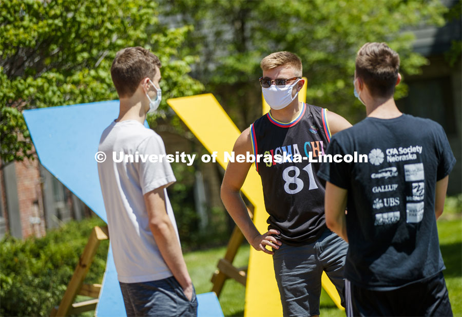 Sigma Chi recruitment day. Sigma Chi members are wearing masks as a result of the COVID-19 pandemic. May 29, 2020. Photo by Craig Chandler / University Communication.