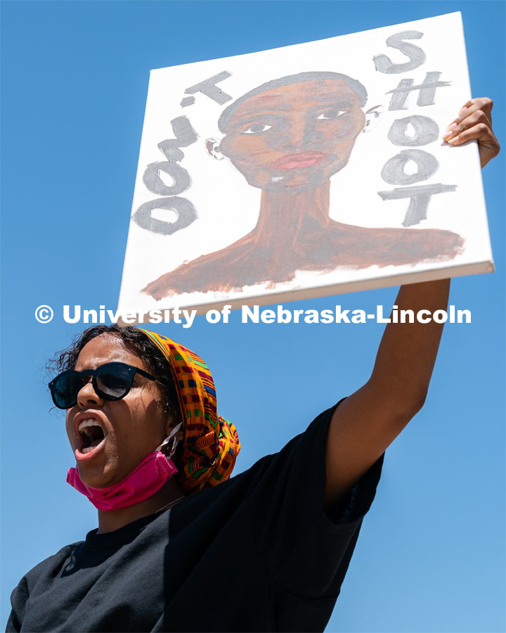 Batool Ibrahim leads protestors in chants outside of Andersen Hall on Saturday, June 13th, 2020, in Lincoln, Nebraska. Black Lives Matter Protest. Photo by Jordan Opp for University Communication.