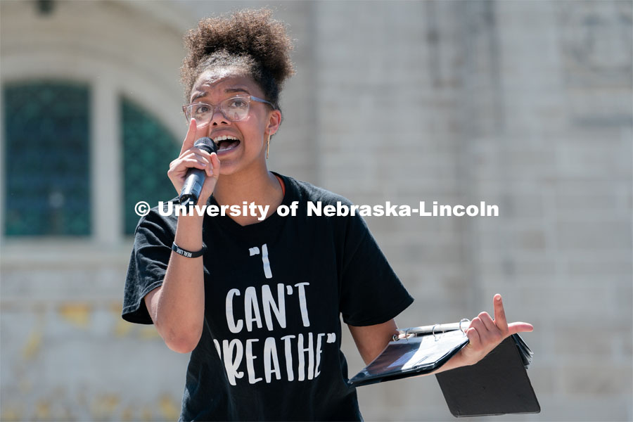 Marshawna Kapke recites a poem to the crowd of protestors outside the Nebraska State Capitol on Saturday, June 13th, 2020, in Lincoln, Nebraska. Black Lives Matter Protest. Photo by Jordan Opp for University Communication.