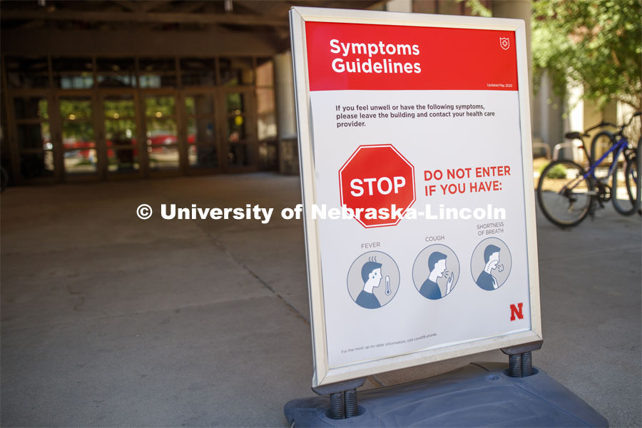 Symptoms guidelines and social distancing signs are strategically placed throughout the Rec Center. First day of Campus Recreation re-opening after being shut down due to COVID-19 concerns. June 15, 2020. Photo by Craig Chandler / University Communication.