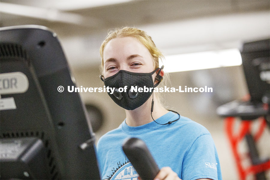 Ellenor Sell works out wearing her mask on the first day of Campus Recreation re-opening after being shut down due to COVID-19 concerns. June 15, 2020. Photo by Craig Chandler / University Communication.