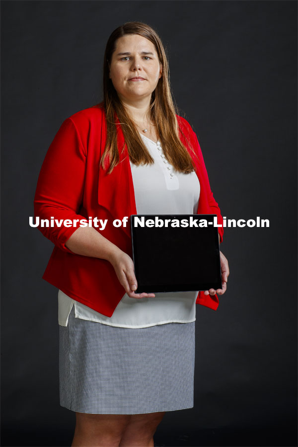 Grace Panther, assistant professor in civil engineering, holds a tablet with her research on teamwork and education during COVID. Photo for the 2019-2020 Report Representing Nebraska’s Research Heroes. June 29, 2020. Photo by Craig Chandler / University Communication.