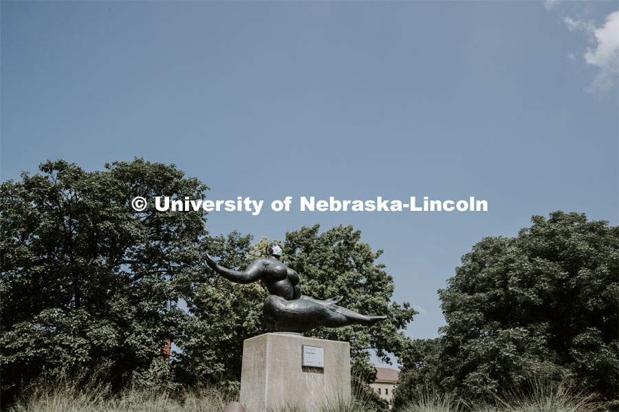 Floating Figure, a sculpture by Gaston Lachaise, is one of many UNL campus sculptures wearing masks. Mask wearing statues on campus. July 6, 2020. Photo by Craig Chandler / University Communication.