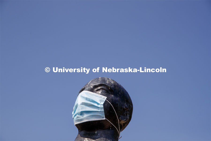 Floating Figure, a sculpture by Gaston Lachaise, is one of many UNL campus sculptures wearing masks. Mask wearing statues on campus. July 6, 2020. Photo by Craig Chandler / University Communication.