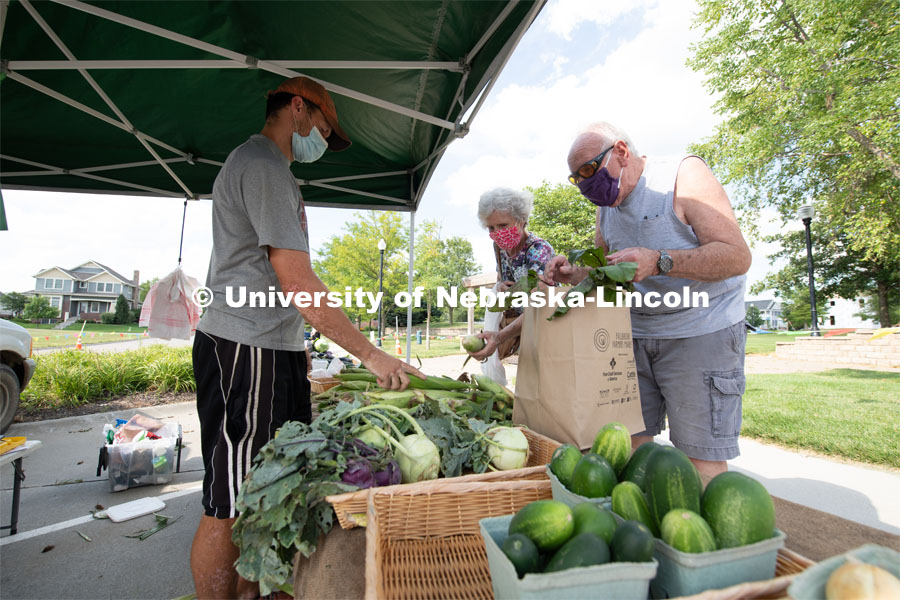 Vendors selling their produce at the Fallbrook Farmers Market in northwest Lincoln, Nebraska. July 23, 2020. Photo by Gregory Nathan / University Communication.