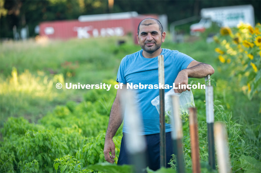 Lincoln families work their garden area at Prairie Pines in east Lincoln. July 27, 2020. Photo by Gregory Nathan / University Communication.