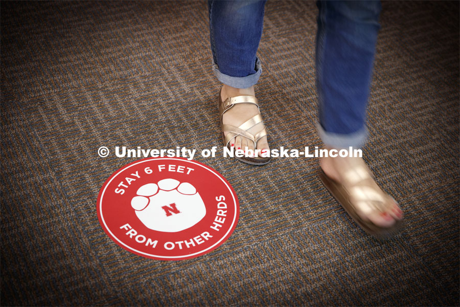 Stickers with elephant feet help patrons keep social distancing in the museum. The Nebraska State Museum in Morrill Hall will open August 5 with new procedures to keep patrons healthy and safe. July 29, 2020. Photo by Craig Chandler / University Communication.