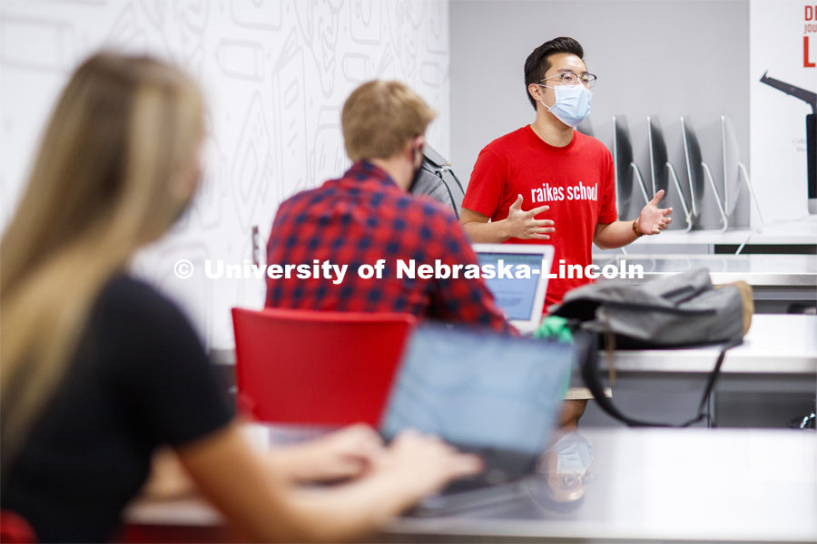Students wear masks as they study in the Lynn and Dana Roper Media Studio in Anderson Hall. Photo shoot of students wearing masks and practicing social distancing. August 11, 2020 Photo by Craig Chandler / University Communication.