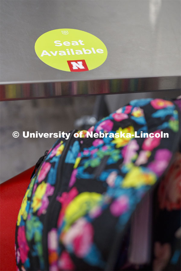 A seat-available sticker marking in Anderson Hall. Photo shoot of students wearing masks and practicing social distancing. August 11, 2020 Photo by Craig Chandler / University Communication.