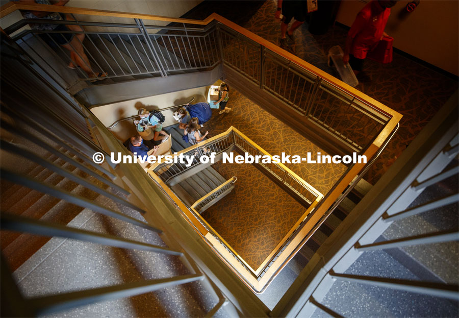 Students and parents use the Knoll stairs to keep the elevators free for the moving crew. First day of residence hall move in. August 13, 2020. Photo by Craig Chandler / University Communication.