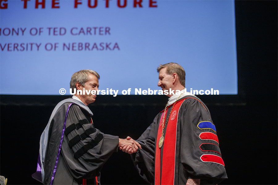 President Ted Carter, right, receives congratulations from Nebraska Regents Chair James D. Pillen after Carter was given the President's medallion. Nebraska University President Ted Carter investiture ceremony. August 14, 2020. Photo by Craig Chandler / University Communication.